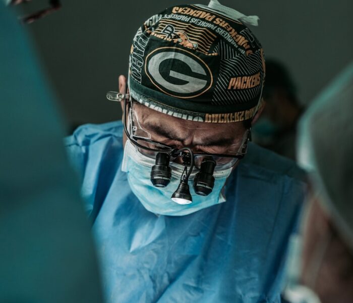 doctor wearing Green Bay Packers hat